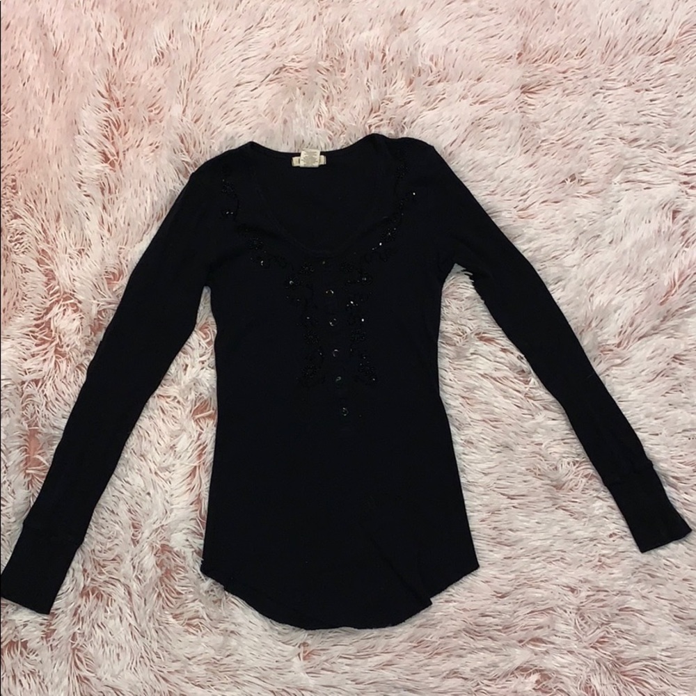 Long sleeved shirt with needed design